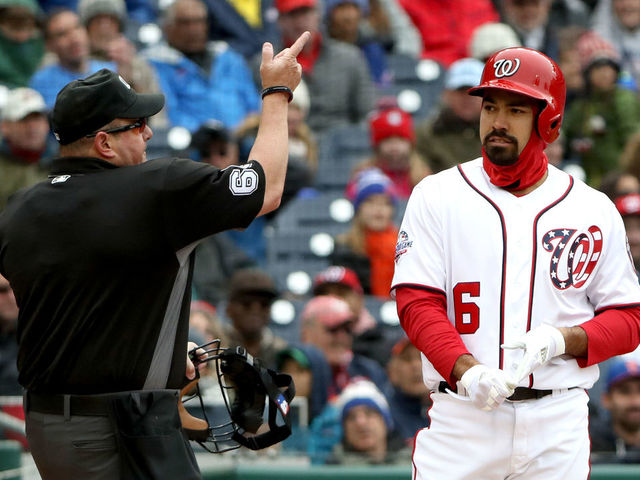 Washington Nationals third baseman Anthony Rendon throws out