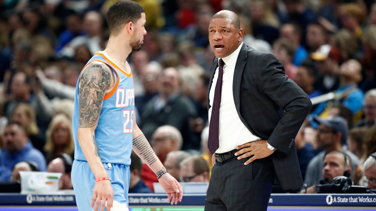INDIANAPOLIS, IN - MARCH 23: Doc Rivers the head coach of the Los Angeles Clippers gives instructions to Austin Rivers #25 against the Indiana Pacers at Bankers Life Fieldhouse on March 23, 2018 in Indianapolis, Indiana. NOTE TO USER: User expressly acknowledges and agrees that, by downloading and or using this