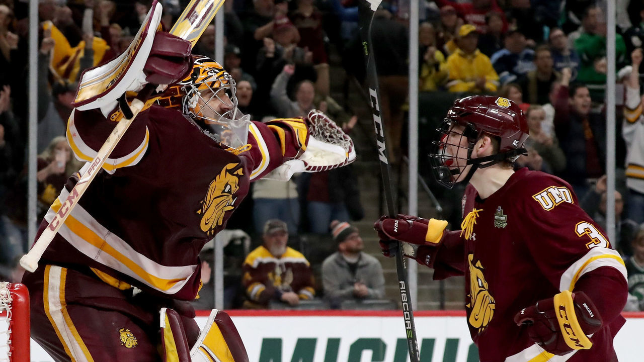 ST PAUL, MN - APRIL 05: Hunter Shepard #32 and Mikey Anderson #3 of the Minnesota-Duluth Bulldogs celebrate the 2-1 win over the Ohio State Buckeyes during the semifinals of the 2018 NCAA Division I Men's Hockey Championships on April 5, 2018 at Xcel Energy Center in St Paul, Minnesota.