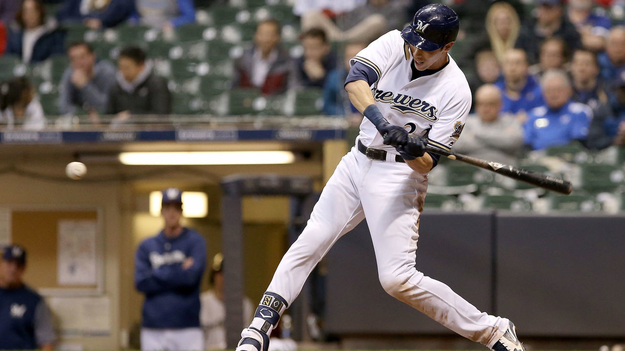 MILWAUKEE, WI - APRIL 03: Christian Yelich #22 of the Milwaukee Brewers hits a home run in the ninth inning against the St. Louis Cardinals at Miller Park on April 3, 2018 in Milwaukee, Wisconsin.