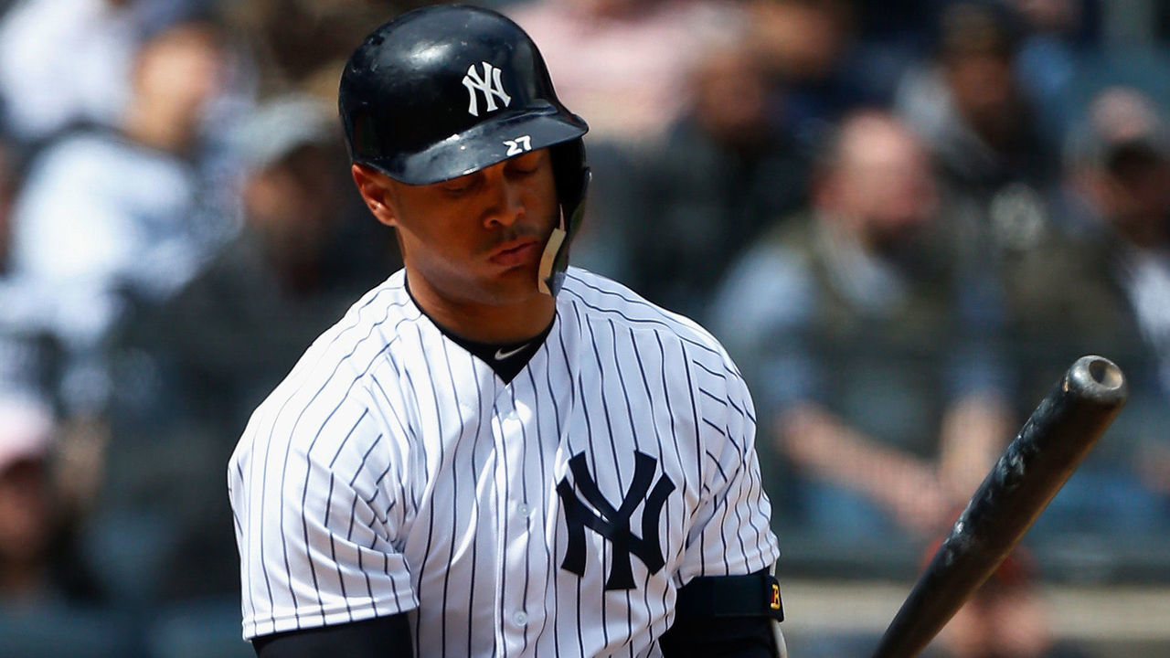 NEW YORK, NY - APRIL 08: Giancarlo Stanton #27 of the New York Yankees reacts after striking out in the second inning against the Baltimore Orioles at Yankee Stadium on April 8, 2018 in the Bronx borough of New York City.