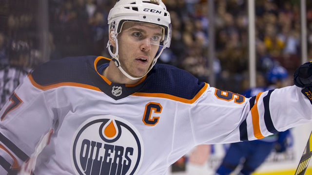 VANCOUVER, BC - MARCH 29: Edmonton Oilers Center Connor McDavid (97) celebrates his goal against the Vancouver Canucks during the first period in a NHL hockey game on March 29, 2018, at Rogers Arena in Vancouver, BC.