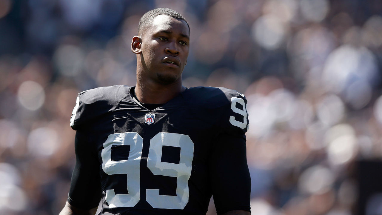 OAKLAND, CA - SEPTEMBER 20: Aldon Smith #99 of the Oakland Raiders stands on the field before their game against the Baltimore Ravens at O.co Coliseum on September 20, 2015 in Oakland, California.