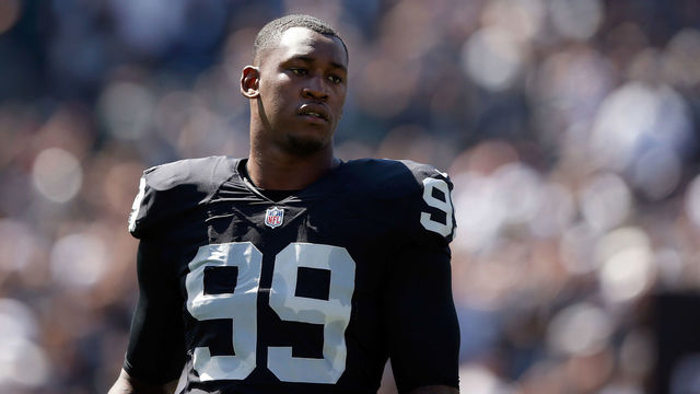 OAKLAND, CA - SEPTEMBER 20: Aldon Smith #99 of the Oakland Raiders stands on the field before their game against the Baltimore Ravens at O.co Coliseum on September 20, 2015 in Oakland, California.