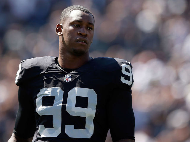 OAKLAND, CA - SEPTEMBER 20: Aldon Smith #99 of the Oakland Raiders stands on the field before their game against the Baltimore Ravens at O.co Coliseum on September 20, 2015 in Oakland, California.