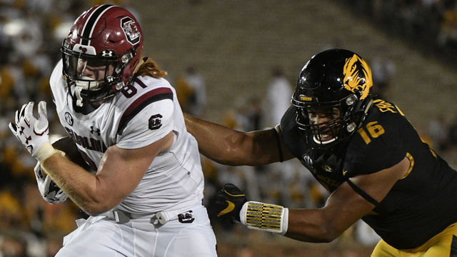 COLUMBIA, MO - SEPTEMBER 9: Tight end Hayden Hurst #81 of the South Carolina Gamecocks gets past Marcell Frazier #16 of the Missouri Tigers as he goes in for a touchdown in the fourth quarter at Memorial Stadium on September 9, 2017 in Columbia, Missouri.