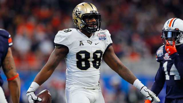 ATLANTA, GA - JANUARY 01: Jordan Akins #88 of the UCF Knights reacts after making a reception in the second half against the Auburn Tigers during the Chick-fil-A Peach Bowl at Mercedes-Benz Stadium on January 1, 2018 in Atlanta, Georgia.