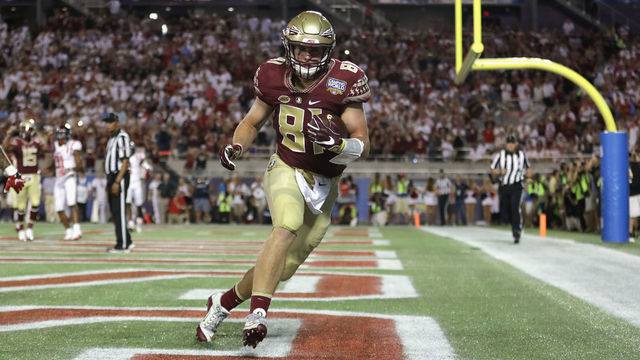 ORLANDO, FL - SEPTEMBER 05: Ryan Izzo #81 of the Florida State Seminoles scores a touchdown in the third quarter against the Mississippi Rebels during the Camping World Kickoff at Camping World Stadium on September 5, 2016 in Orlando, Florida.