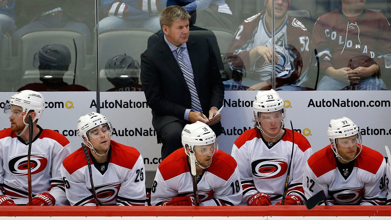 DENVER, CO - OCTOBER 21: Head coach Bill Peters of the Carolina Hurricanes leads his team against the Colorado Avalanche at Pepsi Center on October 21, 2015 in Denver, Colorado. The Hurricanes defeated the Avalanche 1-0 in overtime.