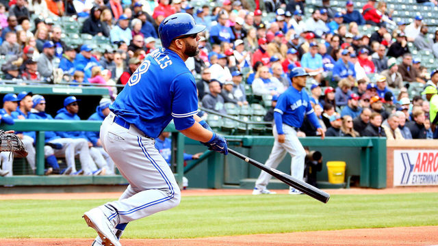 ARLINGTON, TX - APRIL 08: Kendrys Morales #8 of the Toronto Blue Jays hits a home run in the first inning against the Texas Rangers at Globe Life Park in Arlington on April 8, 2018 in Arlington, Texas.