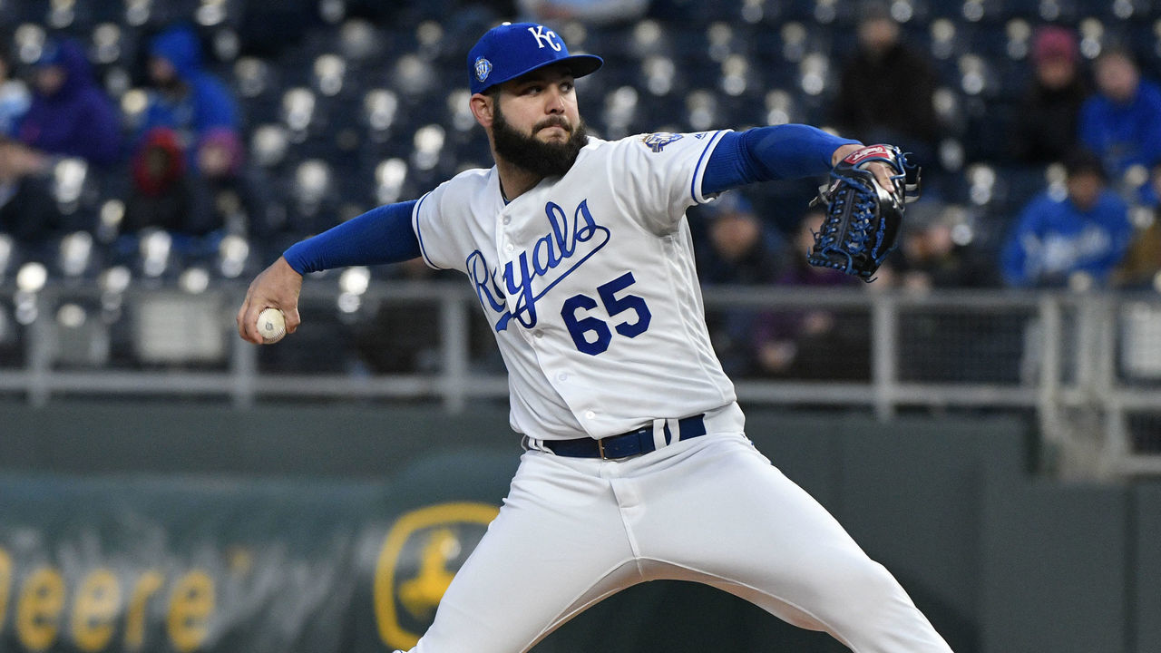 KANSAS CITY, MO - APRIL 9: Jakob Junis #65 of the Kansas City Royals throws in the first inning against the Seattle Mariners at Kauffman Stadium on April 9, 2018 in Kansas City, Missouri.
