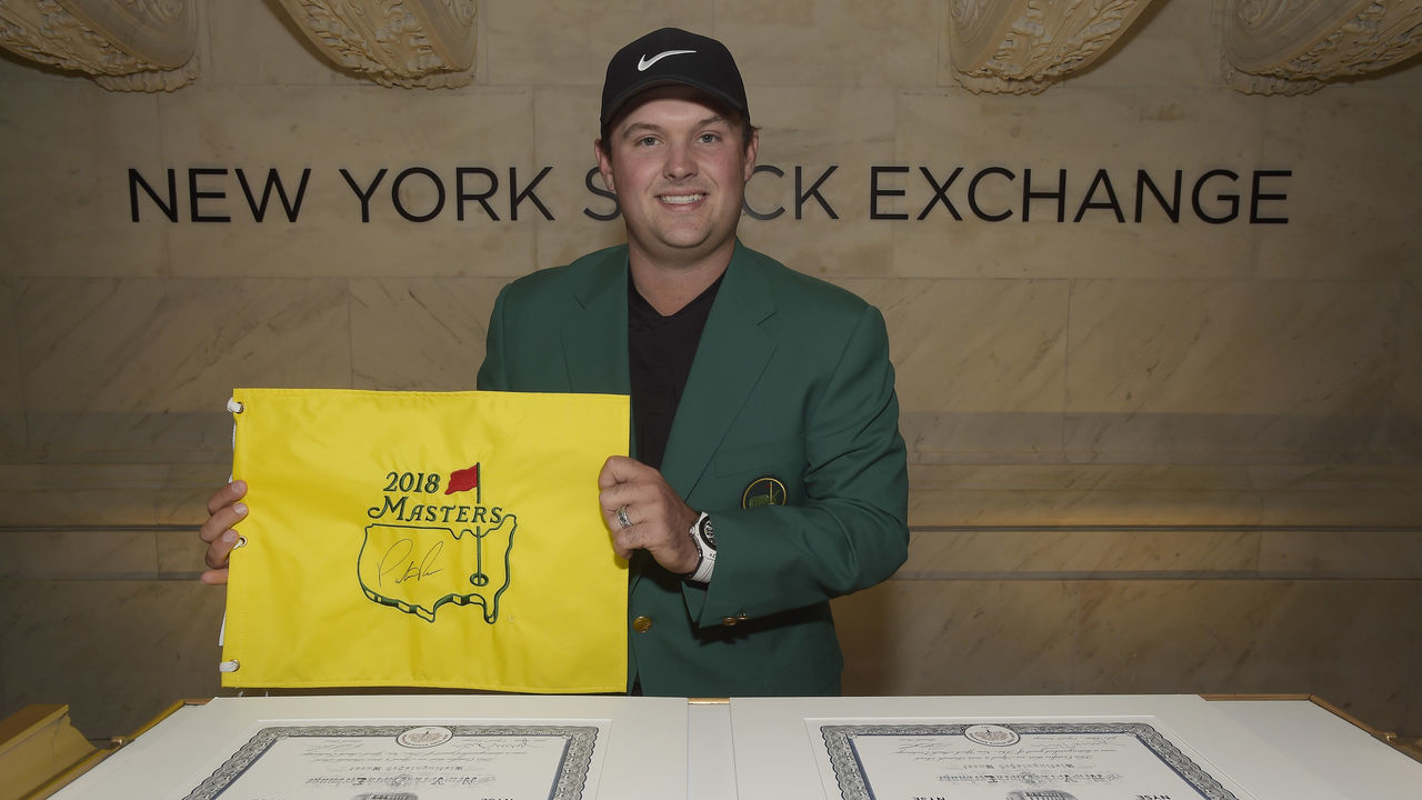 NEW YORK, NY - APRIL 09: Master's champion Patrick Reed poses for a photo at the New York Stock Exchange visit during the Master's winner media tour throughout New York City on April 9, 2018 in New York City, New York.