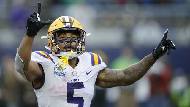 3ORLANDO, FL - JANUARY 01: Derrius Guice #5 of the LSU Tigers reacts after a two-yard reception for touchdown against the Notre Dame Fighting Irish in the fourth quarter of the Citrus Bowl on January 1, 2018 in Orlando, Florida. Notre Dame won 21-17.