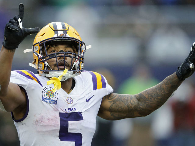 3ORLANDO, FL - JANUARY 01: Derrius Guice #5 of the LSU Tigers reacts after a two-yard reception for touchdown against the Notre Dame Fighting Irish in the fourth quarter of the Citrus Bowl on January 1, 2018 in Orlando, Florida. Notre Dame won 21-17.