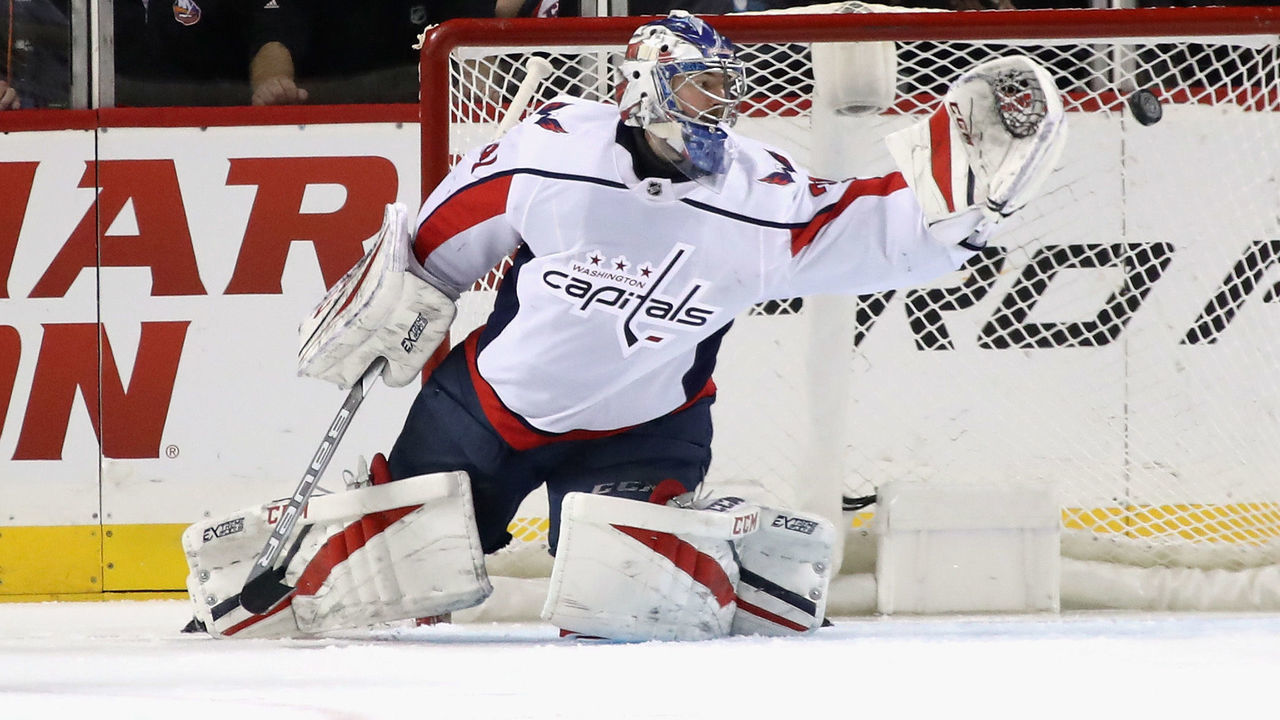 NEW YORK, NY - MARCH 15: Philipp Grubauer #31 of the Washington Capitals makes the first period save against the New York Islanders at the Barclays Center on March 15, 2018 in the Brooklyn borough of New York City.