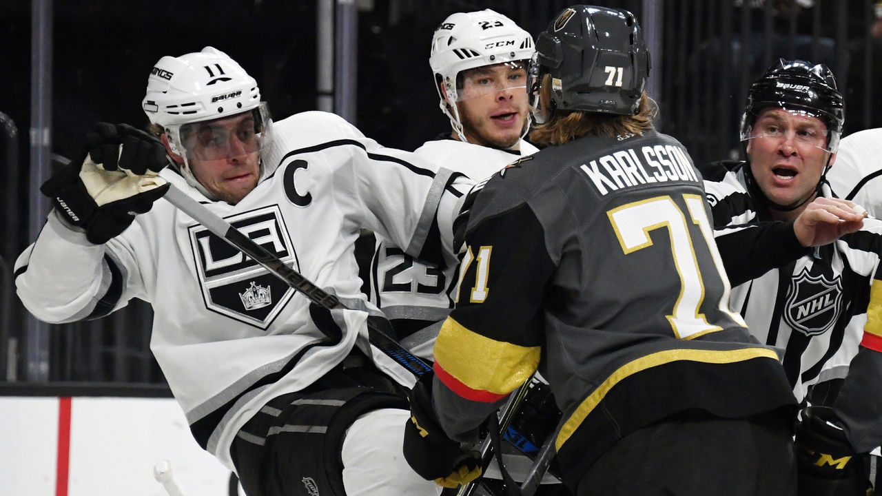 LAS VEGAS, NV - FEBRUARY 27: William Karlsson #71 of the Vegas Golden Knights pushes Anze Kopitar #11 of the Los Angeles Kings down in the first period of their game at T-Mobile Arena on February 27, 2018 in Las Vegas, Nevada. The Kings won 4-1.