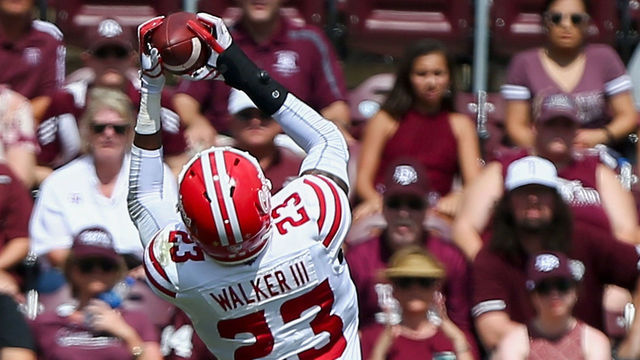 COLLEGE STATION, TX - SEPTEMBER 16: Tracy Walker #23 of the Louisiana-Lafayette Ragin Cajuns intercepts a pass intended for Jhamon Ausbon #2 of the Texas A&M Aggies as Lorenzo Cryer #11 looks on at Kyle Field on September 16, 2017 in College Station, Texas.