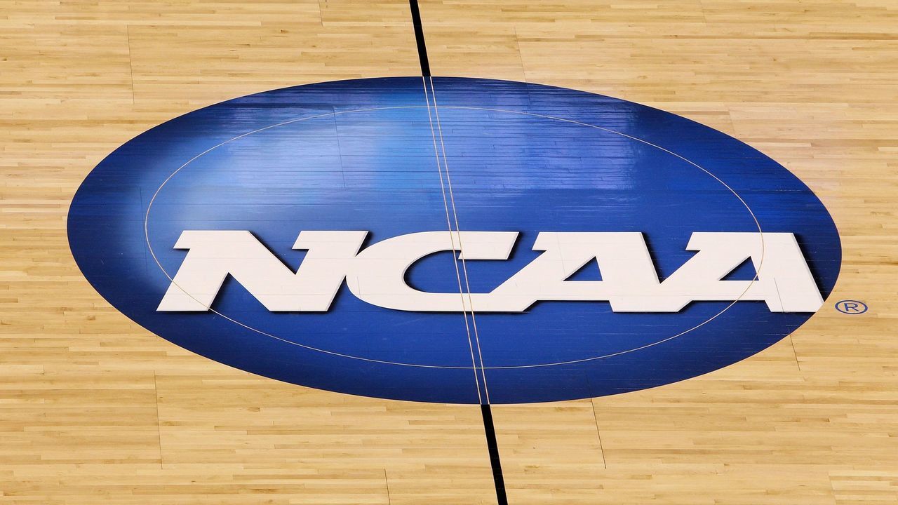 OKLAHOMA CITY - MARCH 20: A detail of a NCAA logo decal is seen at center court as the Kansas State Wildcats play against the Brigham Young Cougars during the second round of the 2010 NCAA men's basketball tournament at Ford Center on March 20, 2010 in Oklahoma City, Oklahoma.