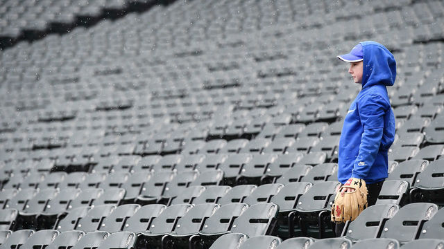 CHICAGO, IL - APRIL 09: A young fan watches the Tampa Bay Rays warm up prior to a game against the Chicago White Sox at Guaranteed Rate Field on April 9, 2018 in Chicago, Illinois.