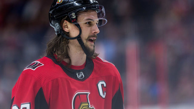 OTTAWA, ON - APRIL 02: Ottawa Senators Defenceman Erik Karlsson (65) prior to a face-off during third period National Hockey League action between the Winnipeg Jets and Ottawa Senators on April 2, 2018, at Canadian Tire Centre in Ottawa, ON, Canada.