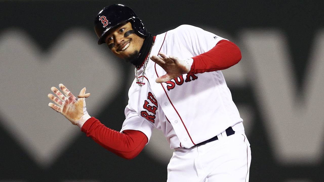 BOSTON, MA - APRIL 10: Mookie Betts #50 of the Boston Red Sox celebrates after hitting a double during the sixth inning against the New York Yankees at Fenway Park on April 10, 2018 in Boston, Massachusetts.