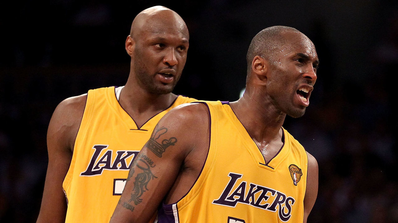 LOS ANGELES, CA - JUNE 15: Kobe Bryant #24 of the Los Angeles Lakers reacts to getting fouled as teammate Lamar Odom #7 of the Lakers looks on in the fourth quarter of Game Six of the 2010 NBA Finals against the Boston Celtics at Staples Center on June 15, 2010 in Los Angeles, California. NOTE TO USER: User expressly acknowledges and agrees that, by downloading and/or using this Photograph, user is consenting to the terms and conditions of the Getty Images License Agreement.