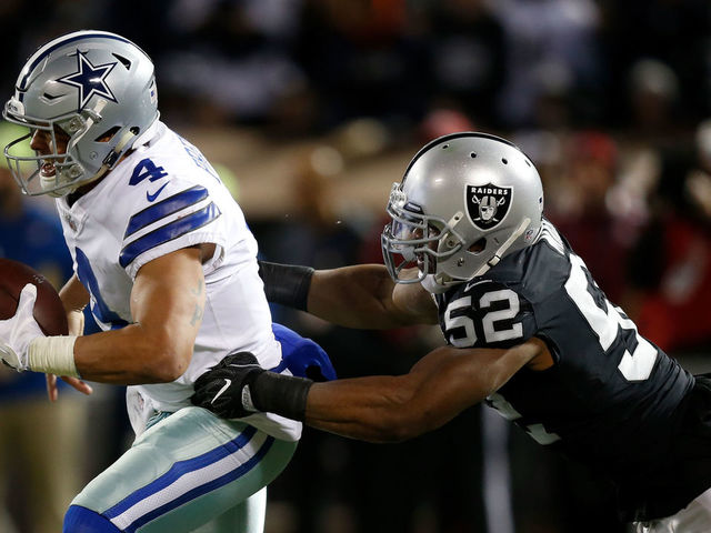 OAKLAND, CA - DECEMBER 17: Khalil Mack #52 of the Oakland Raiders sacks Dak Prescott #4 of the Dallas Cowboys during their NFL game at Oakland-Alameda County Coliseum on December 17, 2017 in Oakland, California.