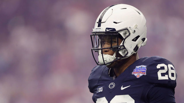 GLENDALE, AZ - DECEMBER 30: Running back Saquon Barkley #26 of the Penn State Nittany Lions walks on the field during the first half of the Playstation Fiesta Bowl against the Washington Huskies at University of Phoenix Stadium on December 30, 2017 in Glendale, Arizona.