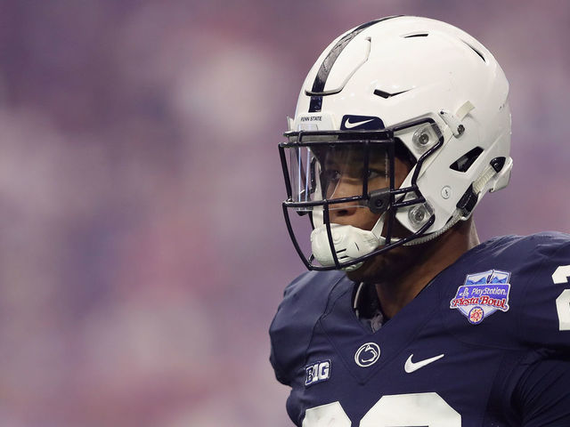 GLENDALE, AZ - DECEMBER 30: Running back Saquon Barkley #26 of the Penn State Nittany Lions walks on the field during the first half of the Playstation Fiesta Bowl against the Washington Huskies at University of Phoenix Stadium on December 30, 2017 in Glendale, Arizona.