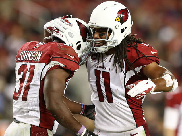 SANTA CLARA, CA - OCTOBER 06: David Johnson #31 of the Arizona Cardinals celebrates after a touchdown with Larry Fitzgerald #11 during their NFL game against the San Francisco 49ers at Levi's Stadium on October 6, 2016 in Santa Clara, California.