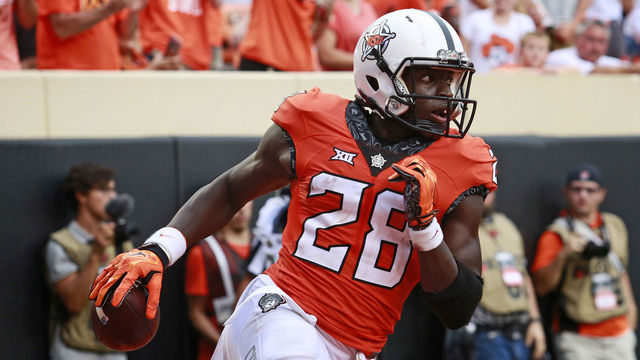 STILLWATER, OK - SEPTEMBER 17 : Wide receiver James Washington #28 of the Oklahoma State Cowboys runs off after a play against the Pittsburgh Panthers September 17, 2016 at Boone Pickens Stadium in Stillwater, Oklahoma.