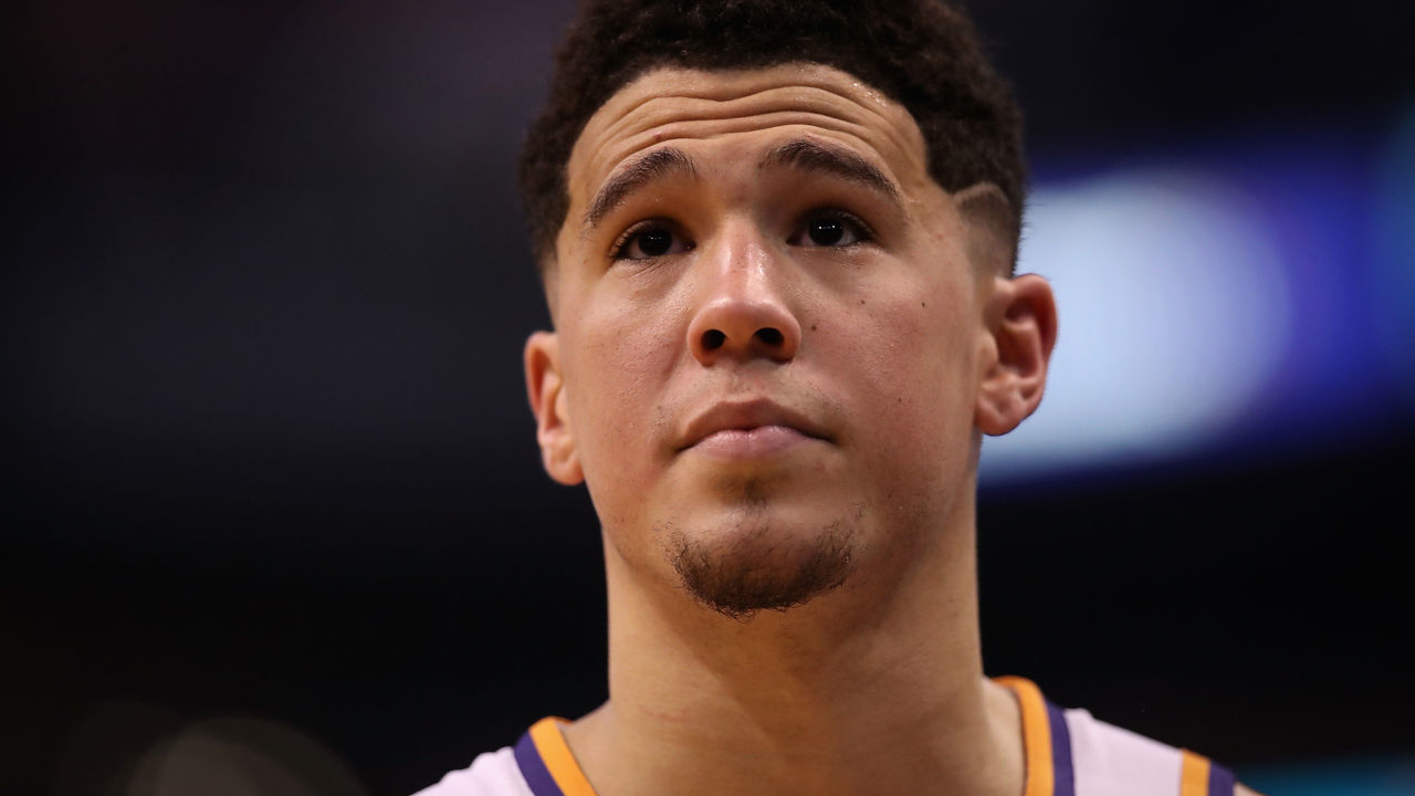 PHOENIX, AZ - MARCH 13: Devin Booker #1 of the Phoenix Suns during the second half of the NBA game against the Cleveland Cavaliers at Talking Stick Resort Arena on March 13, 2018 in Phoenix, Arizona. The Cavaliers defeated the Suns 129-107.