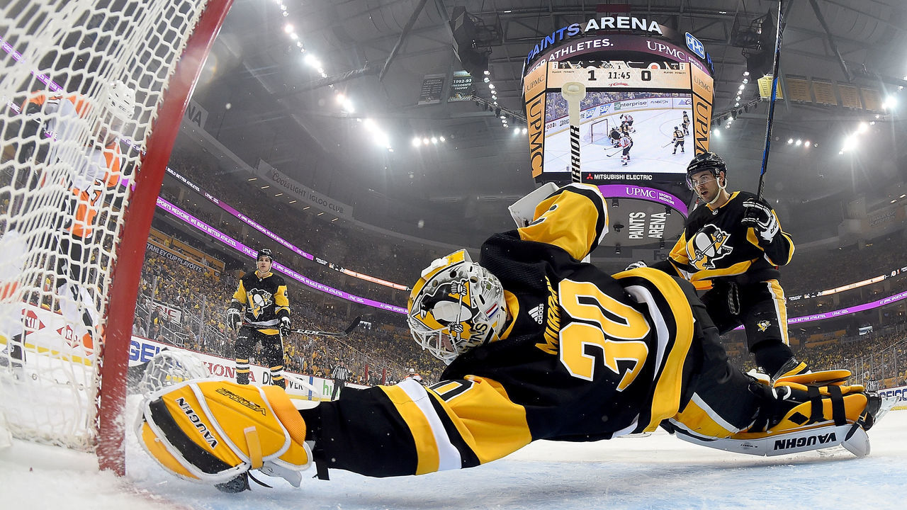 PITTSBURGH, PA - APRIL 11: Matt Murray #30 of the Pittsburgh Penguins makes a diving save against Scott Laughton #21 of the Philadelphia Flyers in Game One of the Eastern Conference First Round during the 2018 NHL Stanley Cup Playoffs at PPG Paints Arena on April 11, 2018 in Pittsburgh, Pennsylvania.