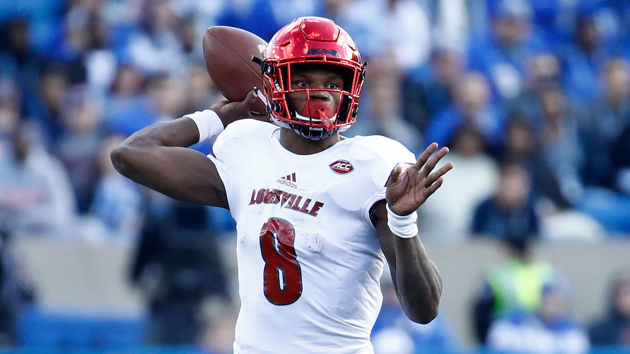 LEXINGTON, KY - NOVEMBER 25: Lamar Jackson #8 of the Louisville Cardinals throws a pass against the Kentucky Wildcats during the game at Commonwealth Stadium on November 25, 2017 in Lexington, Kentucky.