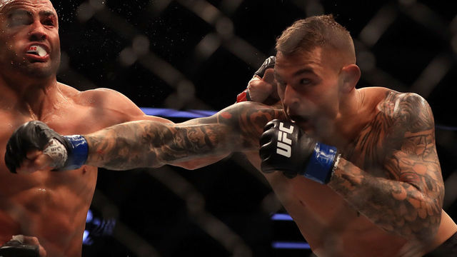 DALLAS, TX - MAY 13: (L-R) Eddie Alvarez fights against Dustin Poirier in their Lightweight bout during UFC 211 at American Airlines Center on May 13, 2017 in Dallas, Texas.