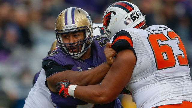 SEATTLE, WA - OCTOBER 22: Defensive lineman Vita Vea #50 of the Washington Huskies battles guard Gus Lavaka #63 of the Oregon State Beavers on October 22, 2016 at Husky Stadium in Seattle, Washington.