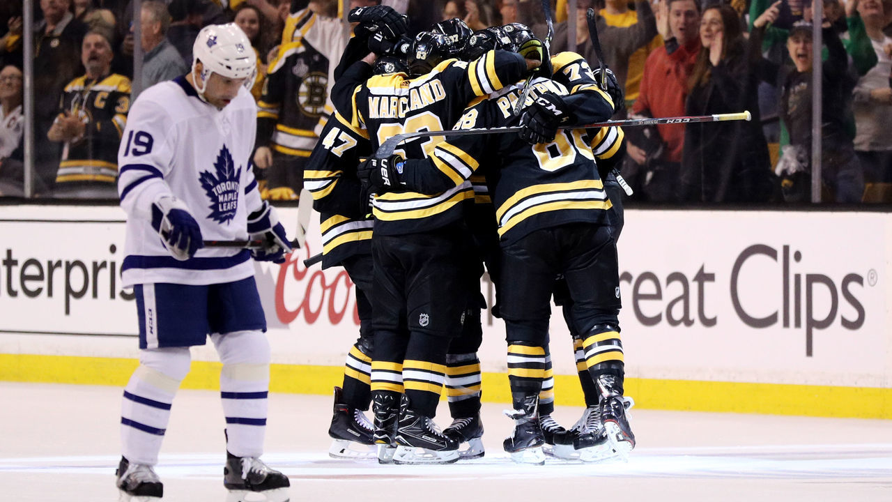 BOSTON, MA - APRIL 12: Tomas Plekanec #19 of the Toronto Maple Leafs reacts as members of the Boston Bruins congratulate David Pastrnak #88 after scoring a goal during the second period of Game One of the Eastern Conference First Round during the 2018 NHL Stanley Cup Playoffs at TD Garden on April 12, 2018 in Boston, Massachusetts.