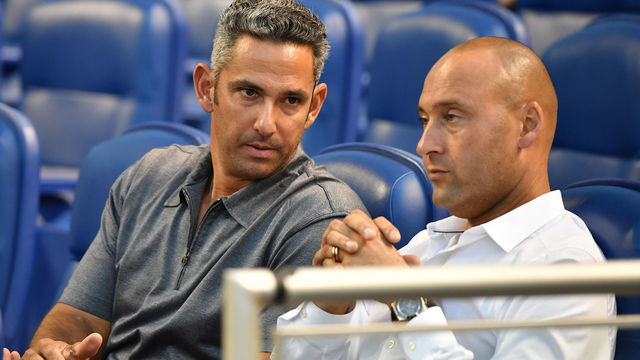 MIAMI, FL - APRIL 02: Former New York Yankee Jorge Posada visits with CEO of the Miami Marlins Derek Jeter during the game against the Boston Red Sox at Marlins Park on April 2, 2018 in Miami, Florida.