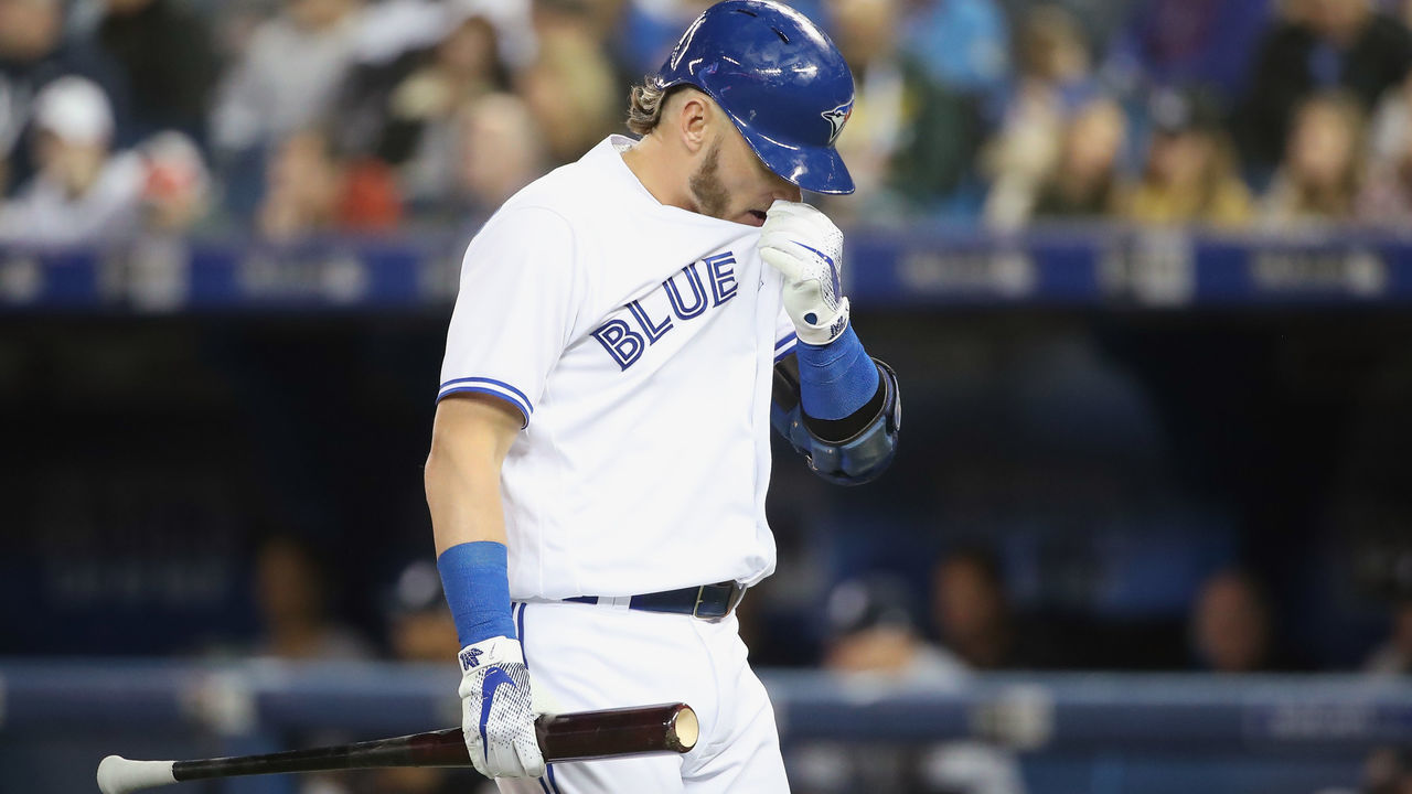 TORONTO, ON - MARCH 30: Josh Donaldson #20 of the Toronto Blue Jays reacts after striking out in the first inning during MLB game action against the New York Yankees at Rogers Centre on March 30, 2018 in Toronto, Canada.