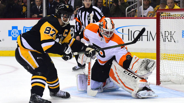 PITTSBURGH, PA - APRIL 13: Brian Elliott #37 of the Philadelphia Flyers makes a save on Sidney Crosby #87 of the Pittsburgh Penguins in Game Two of the Eastern Conference First Round during the 2018 NHL Stanley Cup Playoffs at PPG PAINTS Arena on April 13, 2018 in Pittsburgh, Pennsylvania.