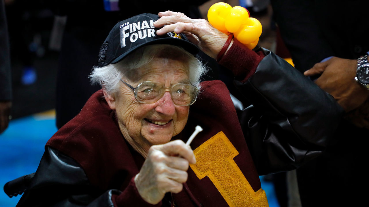 ATLANTA, GA - MARCH 24: Sister Jean Dolores Schmidt celebrates with the Loyola Ramblers after defeating the Kansas State Wildcats during the 2018 NCAA Men's Basketball Tournament South Regional at Philips Arena on March 24, 2018 in Atlanta, Georgia. Loyola defeated Kansas State 78-62