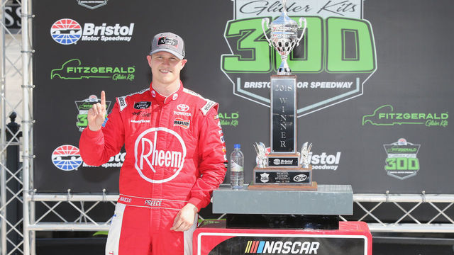 BRISTOL, TN - APRIL 14: Ryan Preece, driver of the #18 Rheem Toyota, poses with the trophy after winning the NASCAR Xfinity Series Fitzgerald Glider Kits 300 at Bristol Motor Speedway on April 14, 2018 in Bristol, Tennessee.
