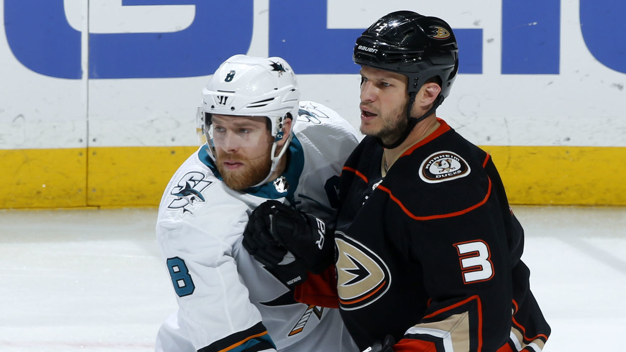 ANAHEIM, CA - FEBRUARY 11: Joe Pavelski #8 of the San Jose Sharks battles for position against Kevin Bieksa #3 of the Anaheim Ducks during the game on February 11, 2018 at Honda Center in Anaheim, California.