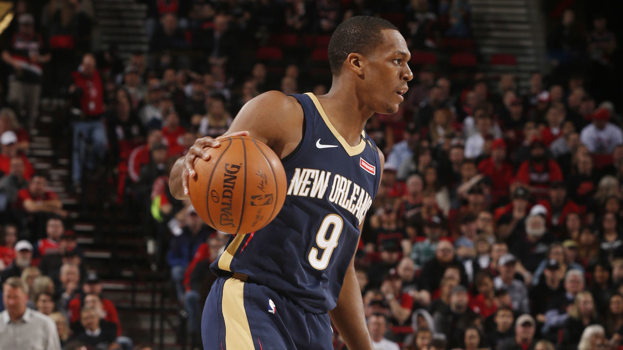 PORTLAND, OR - APRIL 14: Rajon Rondo #9 of the New Orleans Pelicans handles the ball against the Portland Trail Blazers in game one of round one of the 2018 NBA Playoffs on April 14, 2018 at the Moda Center in Portland, Oregon. Mandatory Copyright Notice: Copyright 2018 NBAE