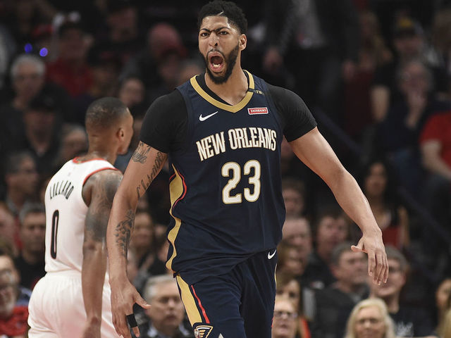 PORTLAND, OR - APRIL 14: Anthony Davis #23 of the New Orleans Pelicans reacts after making a shot during the second half of game one of the the first round of the 2018 NBA Playoffs against the Portland Trail Blazers at the Moda Center on April 14, 2018 in Portland, Oregon. The Pelicans won 97-95.