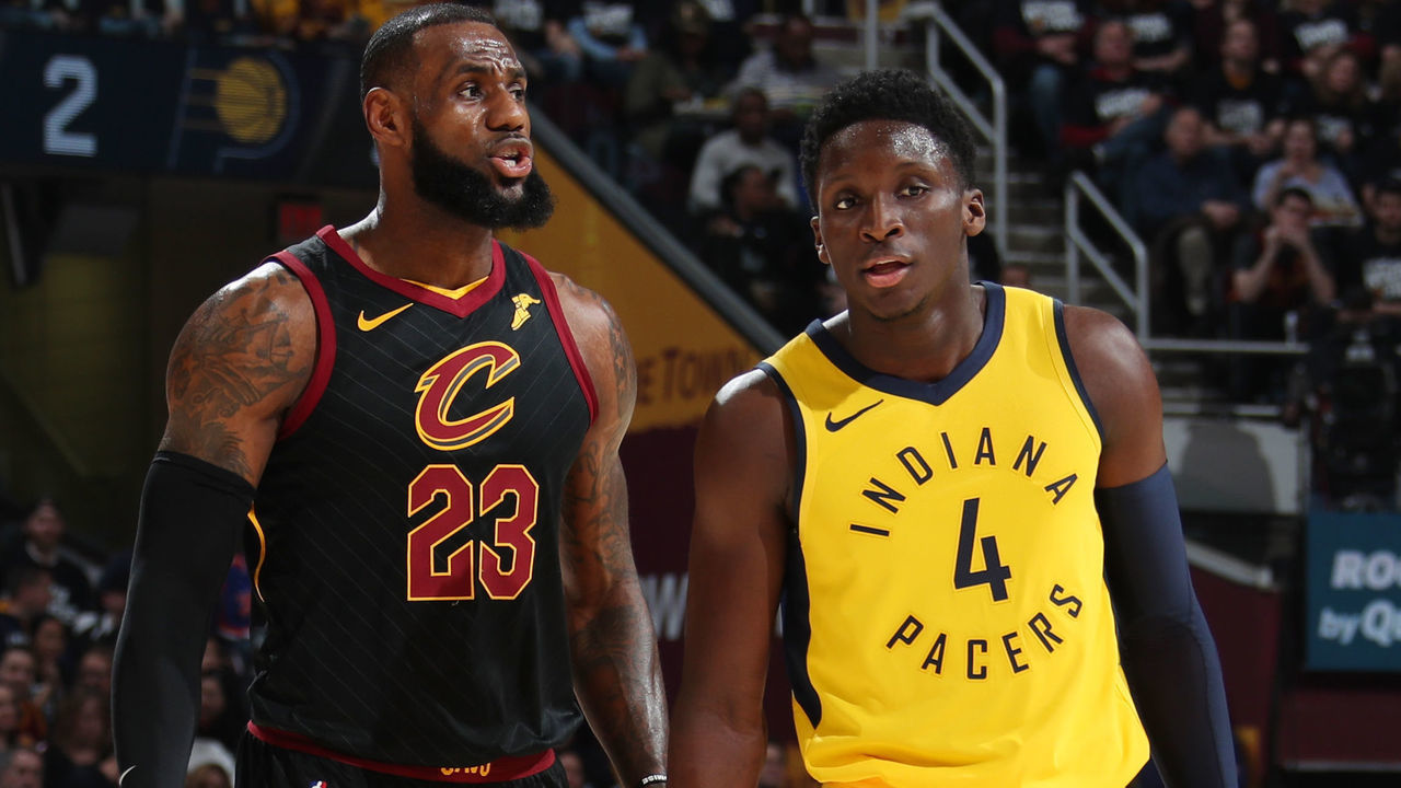 CLEVELAND, OH - APRIL 15: LeBron James #23 of the Cleveland Cavaliers and Victor Oladipo #4 of the Indiana Pacers look on in Game One of Round One of the 2018 NBA Playoffs on April 15, 2018 at Quicken Loans Arena in Cleveland, Ohio. NOTE TO USER: User expressly acknowledges and agrees that, by downloading and or using this photograph, user is consenting to the terms and conditions of Getty Images License Agreement. Mandatory Copyright Notice: Copyright 2018 NBAE