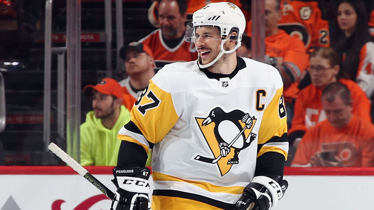 PHILADELPHIA, PA - APRIL 15: Sidney Crosby #87 of the Pittsburgh Penguins celebrates a second period goal by Evgeni Malkin #71 (not shown) against the Philadelphia Flyers in Game Three of the Eastern Conference First Round during the 2018 NHL Stanley Cup Playoffs at the Wells Fargo Center on April 15, 2018 in Philadelphia, Pennsylvania.
