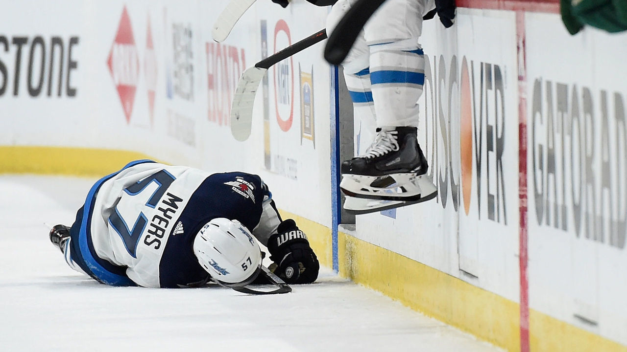 ST PAUL, MN - APRIL 15: Tyler Myers #57 of the Winnipeg Jets lays on the ice during the second period in Game Three of the Western Conference First Round against the Minnesota Wild during the 2018 NHL Stanley Cup Playoffs at Xcel Energy Center on April 15, 2018 in St Paul, Minnesota.