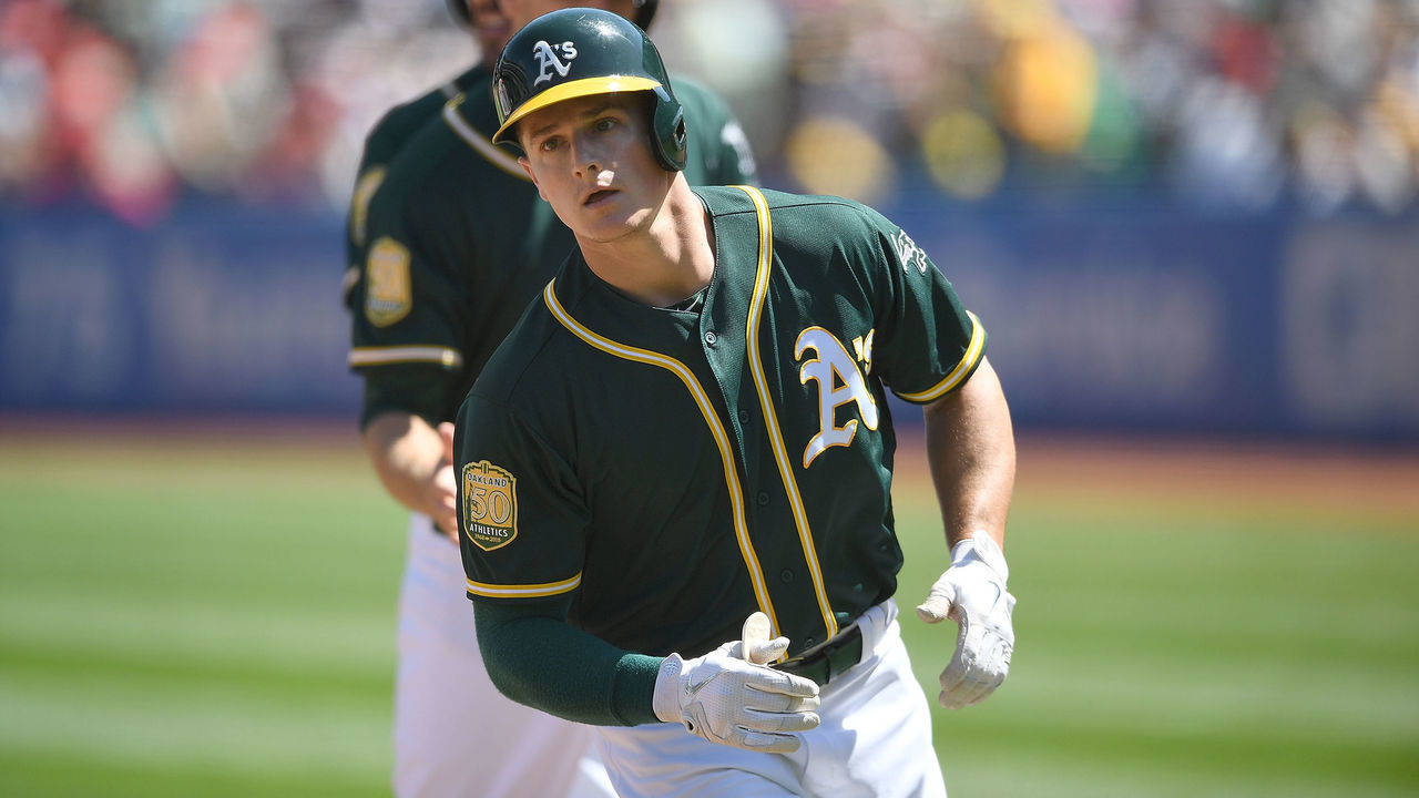 OAKLAND, CA - APRIL 01: Matt Chapman #26 of the Oakland Athletics trots back to the dugout after hitting a three-run homer off of Shohei Ohtani #17 of the Los Angeles Angels of Anaheim in the bottom of the second inning at Oakland Alameda Coliseum on April 1, 2018 in Oakland, California.