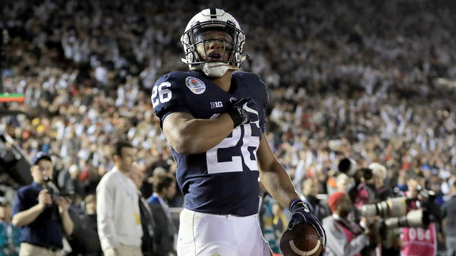 PASADENA, CA - JANUARY 02: Running back Saquon Barkley #26 of the Penn State Nittany Lions celebrates after making a 7-yard touchdown reception in the third quarter against the USC Trojans during the 2017 Rose Bowl Game presented by Northwestern Mutual at the Rose Bowl on January 2, 2017 in Pasadena, California.